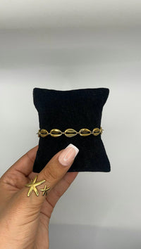 Bracelet coquillage d’or